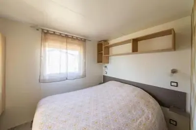 Un ou plusieurs lits dans un hébergement de l'établissement Mobil-home spacieux Capbreton - Proche plage