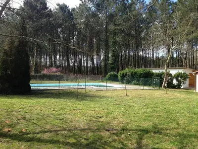 Piscine de l'établissement Villa 8 pers., piscine, Soustons - FR-1-857-68 ou située à proximité