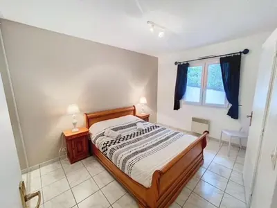 Un ou plusieurs lits dans un hébergement de l'établissement VILLA PYLA SUR MER - INDIVIDUELLE avec PISCINE CHAUFFÉE