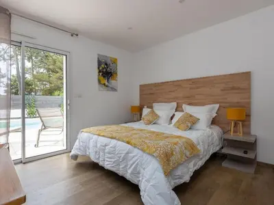 Un ou plusieurs lits dans un hébergement de l'établissement Holiday Home L'Oustaou des Hournails - Das Haus der Hournails by Interhome