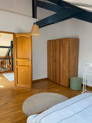 Un ou plusieurs lits dans un hébergement de l'établissement Maison à la campagne avec SPA