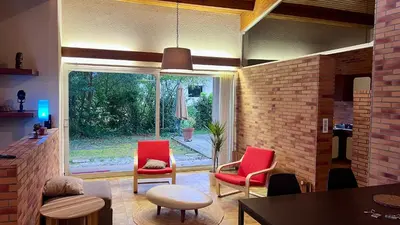 Coin salon dans l'établissement Esprit Californie maison lumineuse avec jardin