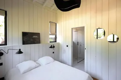 Un ou plusieurs lits dans un hébergement de l'établissement Villa La Nouxa - Archik - Pyla-sur-Mer