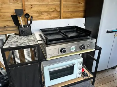 Cuisine ou kitchenette dans l'établissement Mobilhome Le Coin Bonheur