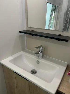 Salle de bains dans l'établissement Mobilhome 592