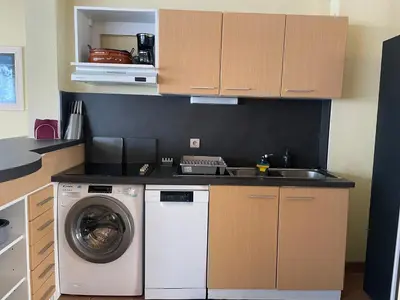 Cuisine ou kitchenette dans l'établissement Maison avec piscine du golf de Gujan