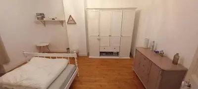 Un ou plusieurs lits dans un hébergement de l'établissement Maison 12 couchages avec piscine privée