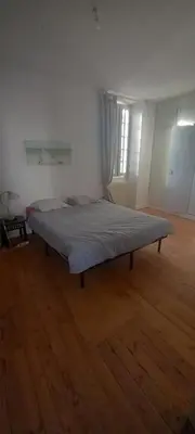 Un ou plusieurs lits dans un hébergement de l'établissement Maison 12 couchages avec piscine privée
