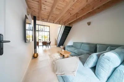 Coin salon dans l'établissement Maison avec Spa et Accès direct au Lac de Cazaux