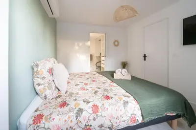 Un ou plusieurs lits dans un hébergement de l'établissement Maison avec Spa et Accès direct au Lac de Cazaux