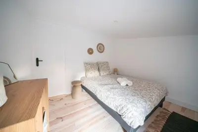 Un ou plusieurs lits dans un hébergement de l'établissement Maison avec Spa et Accès direct au Lac de Cazaux