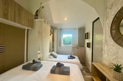 Un ou plusieurs lits dans un hébergement de l'établissement Lodge 203 - Ó Pin Parasol - Camping La Forge 4 - La Teste