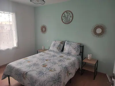 Un ou plusieurs lits dans un hébergement de l'établissement Maison au calme à deux pas du lac