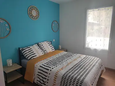 Un ou plusieurs lits dans un hébergement de l'établissement Maison au calme à deux pas du lac