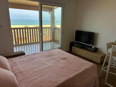 Télévision ou salle de divertissement dans l'établissement Capbreton-Vue Mer-Couple-Enfant