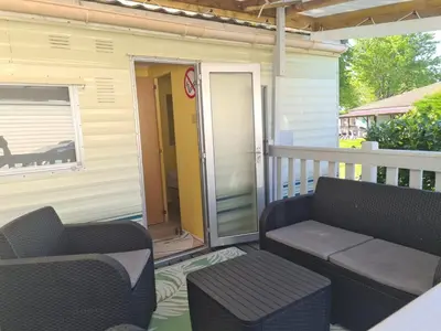 Coin salon dans l'établissement Mobilhome camping Lalande Mimizan