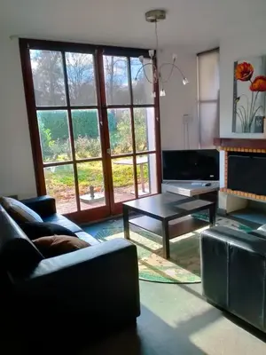 Coin salon dans l'établissement Villa de l Eyre