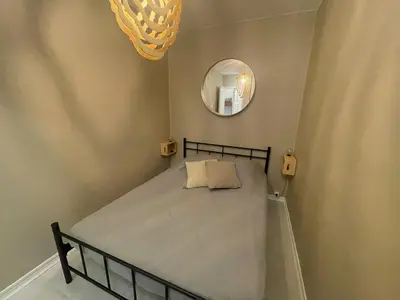 Un ou plusieurs lits dans un hébergement de l'établissement Appartement - Bonamour