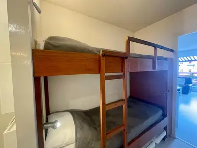 Un ou plusieurs lits superposés dans un hébergement de l'établissement Appartement - Bonamour