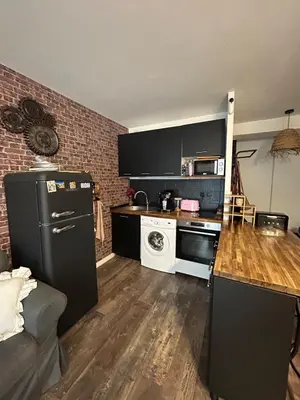 Cuisine ou kitchenette dans l'établissement Studio loft city center
