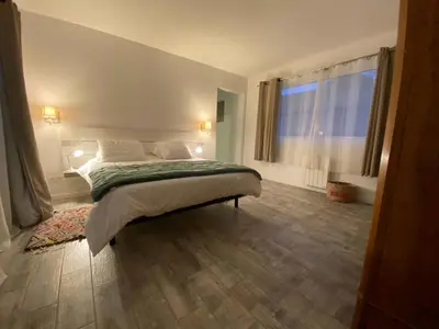Un ou plusieurs lits dans un hébergement de l'établissement Villa d'Exception 7 chambres au coeur du golf de Biscarrosse