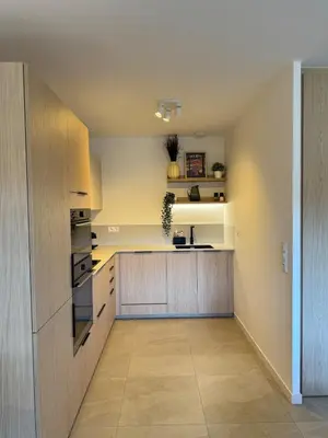 Cuisine ou kitchenette dans l'établissement Appartement Green and Sea, à 10 minutes des plages en vélo