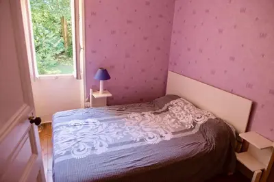 Un ou plusieurs lits dans un hébergement de l'établissement La Chaumière, maison familiale proche Bassin Arcachon
