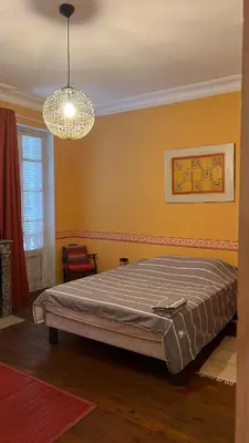 Un ou plusieurs lits dans un hébergement de l'établissement La Chaumière, maison familiale proche Bassin Arcachon