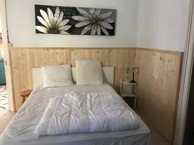 Un ou plusieurs lits dans un hébergement de l'établissement La Chaumière, maison familiale proche Bassin Arcachon