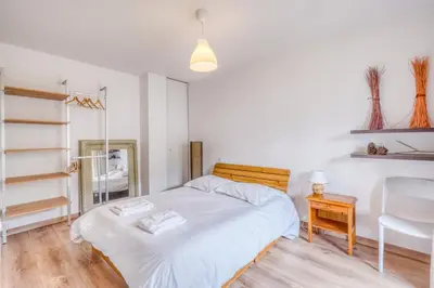 Un ou plusieurs lits dans un hébergement de l'établissement Appartement Esprit Bassin - Eco quartier