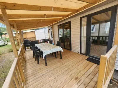 Terrasse ou espace extérieur de l'établissement Mobilhome 3ch 2sdb climatisé