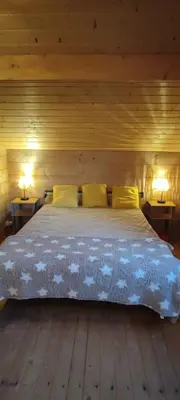 Un ou plusieurs lits dans un hébergement de l'établissement chalet 6 personnes bassin d'arcachon