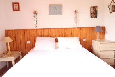 Un ou plusieurs lits dans un hébergement de l'établissement Landaise Lou Pao, 2 maisons, piscine, Lac de Léon