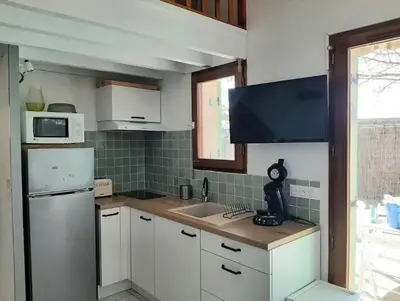 Cuisine ou kitchenette dans l'établissement Maison 6 personnes avec jardin derrière la dune