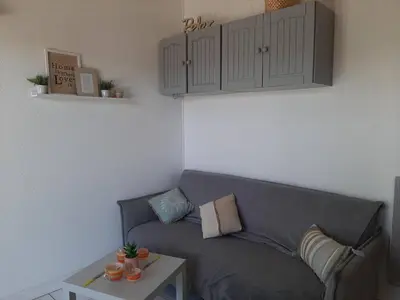 Coin salon dans l'établissement Maison 6 personnes avec jardin derrière la dune