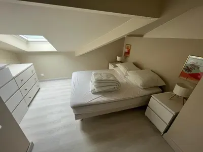 Un ou plusieurs lits dans un hébergement de l'établissement Bisca Dune Stay Duplex rénové vue dune 150m de l'océan