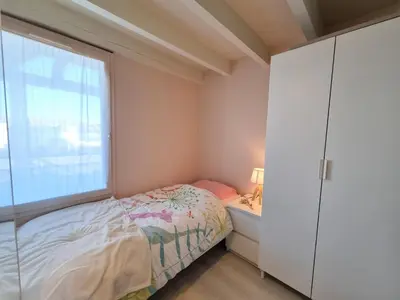 Un ou plusieurs lits dans un hébergement de l'établissement Bisca Dune Stay Duplex rénové vue dune 150m de l'océan