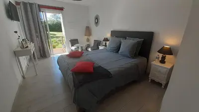 Un ou plusieurs lits dans un hébergement de l'établissement Gîte & Chambres d'Hôtes - Le Petit Bali