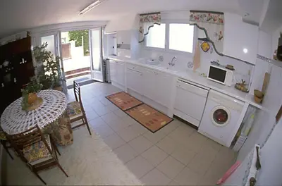 Cuisine ou kitchenette dans l'établissement L'Hernani
