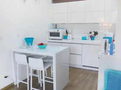 Cuisine ou kitchenette dans l'établissement Apartment Les Berges Landaises-1 by Interhome