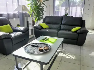 Coin salon dans l'établissement Holiday Home Sainte Marie by Interhome