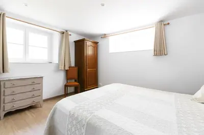 Un ou plusieurs lits dans un hébergement de l'établissement Appartements - Chez Alice