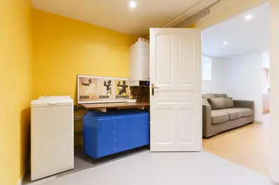 Cuisine ou kitchenette dans l'établissement Appartements - Chez Alice