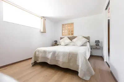 Un ou plusieurs lits dans un hébergement de l'établissement Appartements - Chez Alice