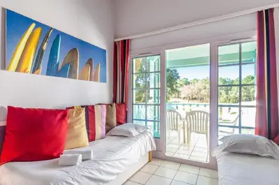 Un ou plusieurs lits dans un hébergement de l'établissement Residence Moliets - maeva Home