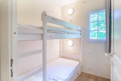 Un ou plusieurs lits dans un hébergement de l'établissement Residence Moliets - maeva Home