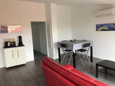 Coin salon dans l'établissement Les Locations du Bassin Appartements Alexandre