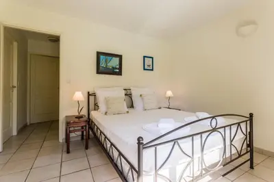 Un ou plusieurs lits dans un hébergement de l'établissement Madame Vacances Villas la Clairière aux Chevreuils