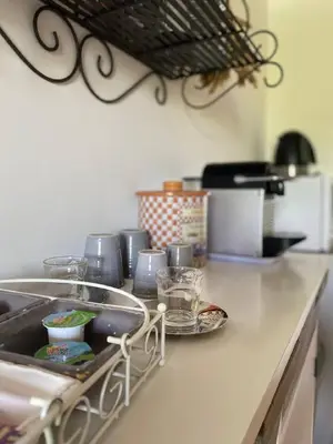 Cuisine ou kitchenette dans l'établissement Les Ecuries du SEQUE