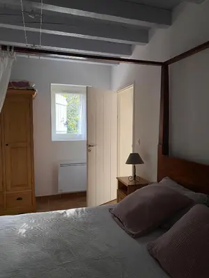 Un ou plusieurs lits dans un hébergement de l'établissement Gîtes & Spa de charme 